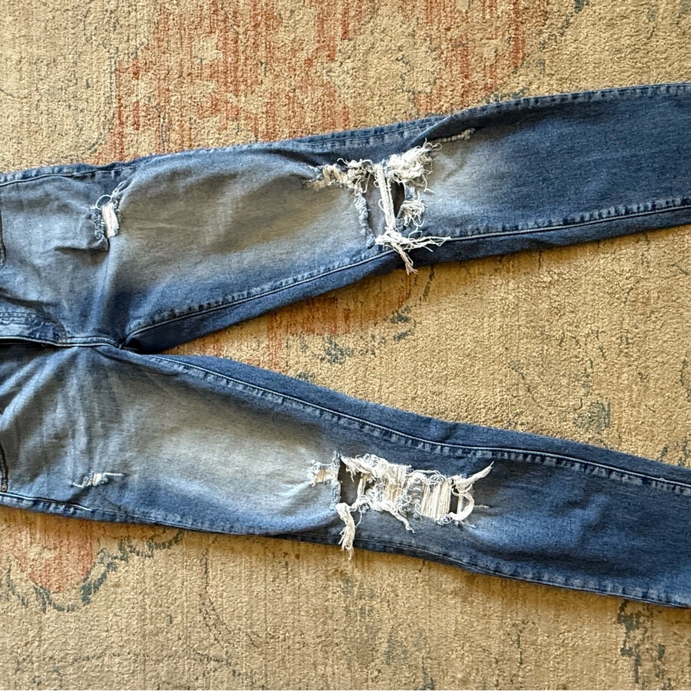 Distressed Blue Jeans